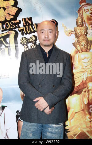 Regista cinese e attore Xu Zheng pone come egli arriva per la premiere del suo ultimo film, perso in Thailandia, a Hong Kong, Cina, 24 gennaio 2013. Foto Stock