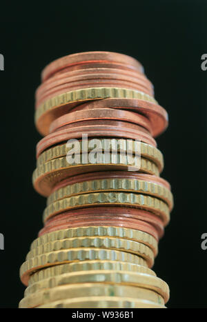 Pila di centesimi di euro monete Foto Stock