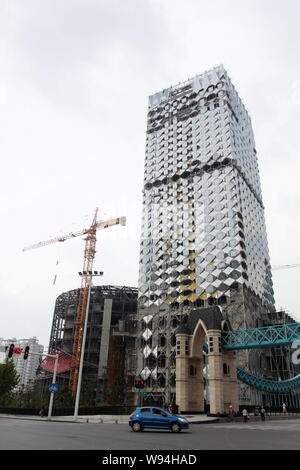 Le sette stelle, Wanda regnare Wuhan, è in costruzione nella città di Wuhan, porcellane centrale provincia di Hubei, 24 agosto 2013. L'hotel è detto di essere Foto Stock