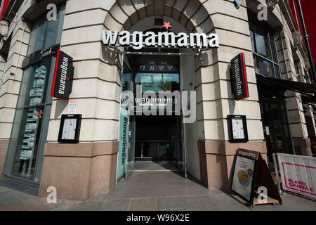 Il Wagamama cucina Giapponese ristorante situato in Printworks nel centro della città di Manchester. Foto Stock