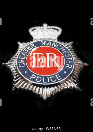 Casco distintivo della Polizia di Greater Manchester, Regno Unito Foto Stock