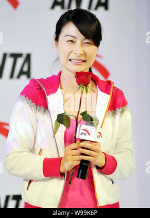 Cinese campione del diving Guo Jingjing assiste una campagna commerciale per anta in Pechino, Cina, Marzo 15, 2011. Foto Stock