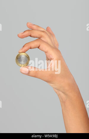 Close up of a person&#39;s hand showing Indian coin Stock Photo