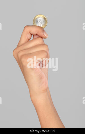 Close up of a person&#39;s hand showing Indian coin Stock Photo