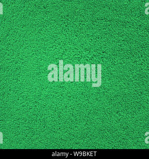 Green towel tessiturali superficie. Verde sullo sfondo di asciugamani Foto Stock