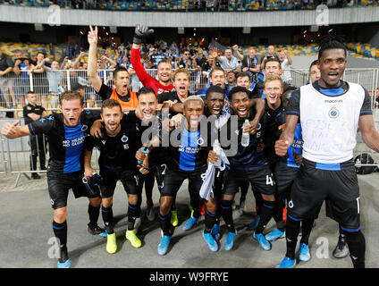 I giocatori di Brugge celebrare dopo la UEFA Champions League terzo turno di qualificazione della seconda gamba partita di calcio tra FC Dynamo Kyiv e Club Brugge KV, al NSC Olimpiyskiy stadium di Kiev, in Ucraina. (Punteggio finale; Dynamo Kyiv 3:3 Club Brugge KV) Foto Stock