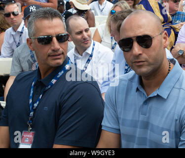 Derek Jeter e Yankees venite a Cooperstown a tifare per induzioni alla Hall of Fame(inclusi ex compagni di squadra - Mariano Rivera & Mike Mussina) Foto Stock