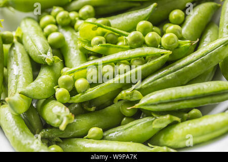 Fresco verde i semi di pisello e cialde - Close up Foto Stock