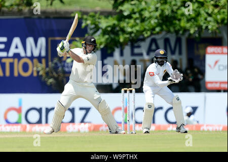 Galle, Sri Lanka. 14 Ago, 2019. Tom Latham della Nuova Zelanda a giocare un colpo durante il primo giorno del primo test match tra lo Sri Lanka e la Nuova Zelanda a Galle International Stadium. (Foto di Isuru Peiris/Pacific Stampa) Credito: Pacific Press Agency/Alamy Live News Foto Stock