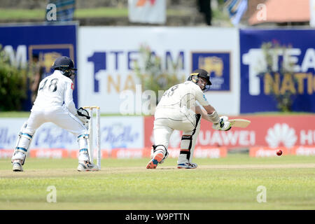 Galle, Sri Lanka. 14 Ago, 2019. Tom Latham della Nuova Zelanda a giocare un colpo durante il primo giorno del primo test match tra lo Sri Lanka e la Nuova Zelanda a Galle International Stadium. (Foto di Isuru Peiris/Pacific Stampa) Credito: Pacific Press Agency/Alamy Live News Foto Stock