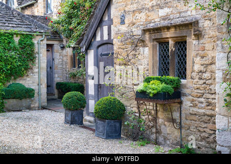 Pietra e legno incorniciata house casa in sheep street. Burford, Cotswolds, Oxfordshire, Inghilterra Foto Stock