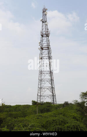 Low angle view of a cell phone tower, New Delhi, India Stock Photo