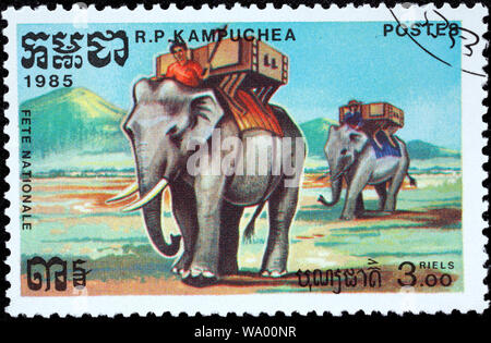 Elefante asiatico, Elephas maximus, Kornak, Howdah, francobollo, Cambogia, 1985 Foto Stock