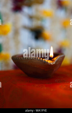 Close up of a burning oil lamp Stock Photo