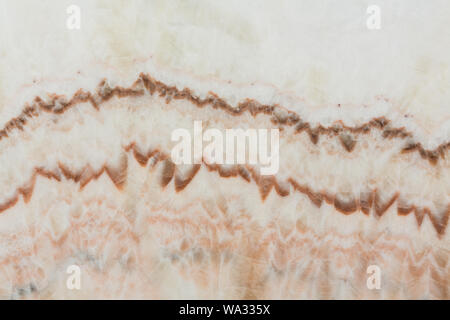 Luci decorative marrone, beige superficie onyx, texture su macro. Foto ad alta risoluzione. Foto Stock