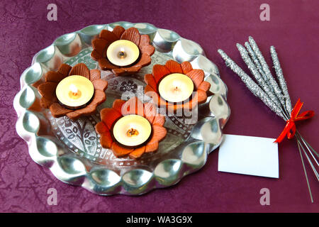 Close up of oil lamps with fire crackers Stock Photo