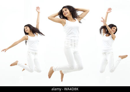 Immagini multiple di una giovane donna che salta in aria Foto Stock