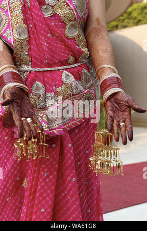 Midsection of an Indian bride showing her mehendi Stock Photo