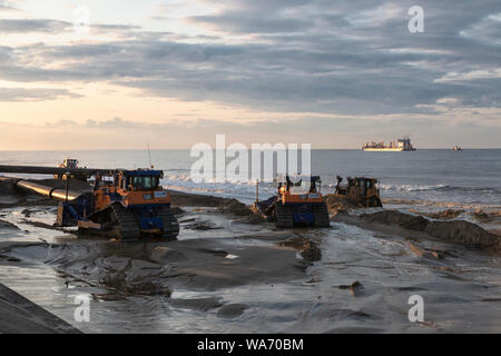 Opere di scultura in sabbia, Walcott, Norfolk, East Anglia, UK Foto Stock