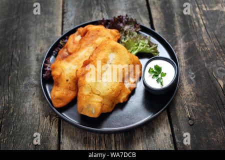 Pesce fritto nel pangrattato. Il pesce dalla padella Foto Stock