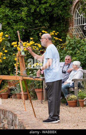 Artisti pittura presso il National Trust è Flatford Mill reso famoso dalla artista John Constable 1776 -1837, Suffolk, Inghilterra, Regno Unito Foto Stock