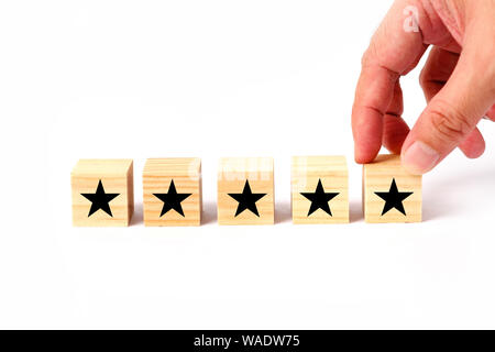 Il servizio clienti di valutazione e di sondaggio di soddisfazione concetto con stelle di valutazione. Foto Stock