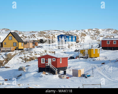 Saatut villaggio di pescatori durante l inverno in Uummannaq Fjord, a nord del circolo polare. La Groenlandia. Foto Stock