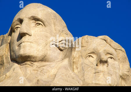 La luce del mattino su Washington Jefferson e dettaglio, Mount Rushmore National Memorial, il Dakota del Sud, Stati Uniti d'America. Foto Stock