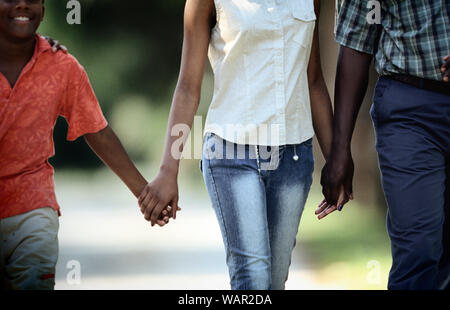 Le persone con mani e piedi. Foto Stock