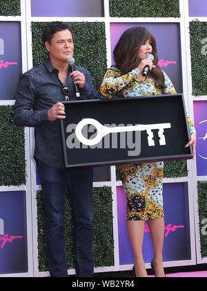 Las Vegas, NV, Stati Uniti d'America. 23 Ago, 2019. Donny Osmond, Marie Osmond ad una apparizione pubblica per Donny e Marie Osmond per ricevere le chiavi al Las Vegas Strip, il Flamingo Las Vegas, Las Vegas NV, Agosto 23, 2019. Credito: MORA/Everett raccolta/Alamy Live News Foto Stock