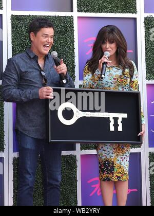 Las Vegas, NV, Stati Uniti d'America. 23 Ago, 2019. Donny Osmond, Marie Osmond ad una apparizione pubblica per Donny e Marie Osmond per ricevere le chiavi al Las Vegas Strip, il Flamingo Las Vegas, Las Vegas NV, Agosto 23, 2019. Credito: MORA/Everett raccolta/Alamy Live News Foto Stock