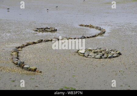 Yin e yang beach river rock formazione. Te Araroa Trail. Riverton. Southland. Isola del Sud. Nuova Zelanda Foto Stock