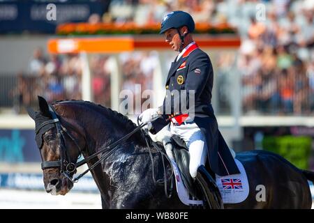 Rotterdam. Paesi Bassi. Il 24 agosto 2019. Carl Hester (GBR) riding Hawtins delicato nel FEI Grand Prix offerte presso il FEI Longines Campionati Europei. Dressage. Credit Elli Birch/SIP Agenzia fotografica/Alamy live news. Foto Stock