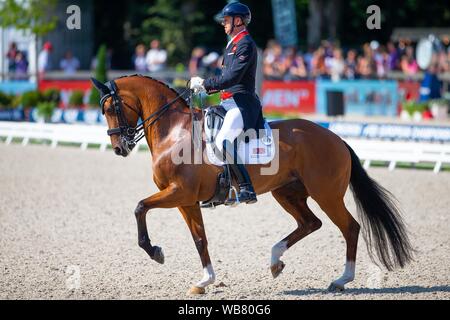 Rotterdam. Paesi Bassi. Il 24 agosto 2019. Gareth Hughes (GBR) equitazione Briolinca classico nel FEI Grand Prix offerte presso il FEI Longines Campionati Europei. Dressage. Credit Elli Birch/SIP Agenzia fotografica/Alamy live news. Foto Stock