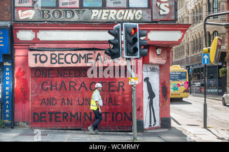 Rambo il tatuaggio e body piercing parlor (piano superiore) Shudehill, Northern Quarter di Manchester. In Inghilterra. Regno Unito Foto Stock