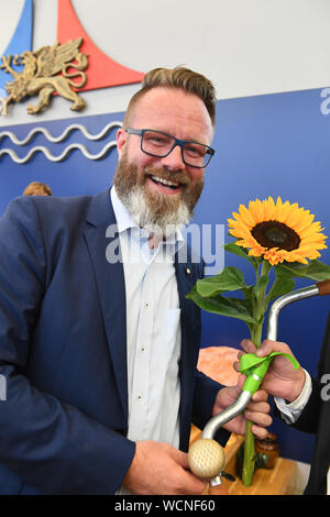 Rostock, Germania. 28 Agosto, 2019. Il danese Claus Ruhe Madsen (non parte) è il nuovo sindaco della città di Rostock. Egli è il primo sindaco di una grande città con più di 200.000 abitanti senza un passaporto tedesco. Madsen vuole spostare nel suo ufficio il 09/02/2019. Credito: Stefan Sauer/dpa-Zentralbild/dpa/Alamy Live News Foto Stock