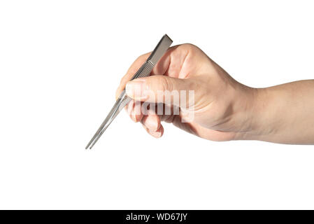 Stretta di mano d'uomo in possesso di una pinzetta a molla Foto Stock