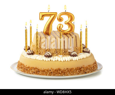 Torta di festa con golden candele - Numero 73 Foto Stock