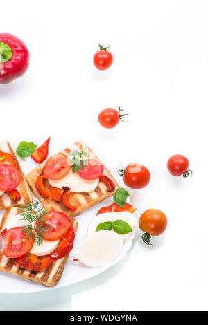 Primo piano di un sandwich freschi con mozzarella, pomodoro Foto Stock