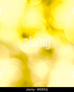 Bokeh sfondo giallo, astratto luce e colori Foto Stock