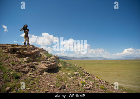 Il mongolo eagle hunter Foto Stock