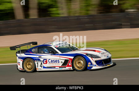 Auto 14, si brucia, Rob Boston Racing, Ginetta GT4 Supercup, Oulton Park prove libere di venerdì Foto Stock