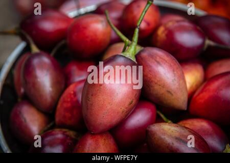 Indonesia Sulawesi island, Toraja paese, Tana Toraja Tana Toraja, Rantepao mercato, Tamarillo Foto Stock