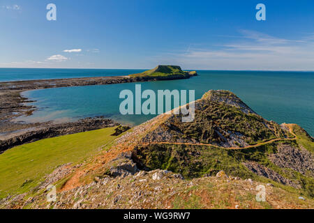 Worm testa è collegata al resto della Penisola di Gower da una pericolosa tidal causeway attraverso il roccioso foreshore, South Wales, Regno Unito Foto Stock