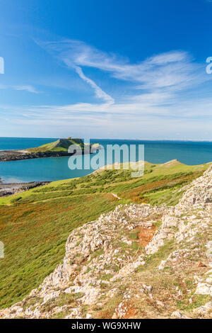 Worm testa è collegata al resto della Penisola di Gower da una pericolosa tidal causeway attraverso il roccioso foreshore, South Wales, Regno Unito Foto Stock