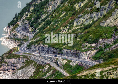 Diga vicino al Passo del Grimsel tra alpi svizzere, Svizzera Foto Stock