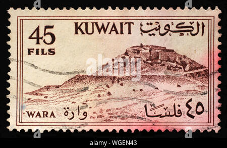 Timbro stampato in Kuwait mostra Wara hill, circa 1961. Foto Stock