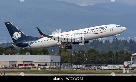 Richmond, British Columbia, Canada. 31 Agosto, 2019. Un Aeromexico Boeing 737-800 (XA-AMK) single-corridoio aereo jet decolla dall'Aeroporto Internazionale di Vancouver. Credito: Bayne Stanley/ZUMA filo/Alamy Live News Foto Stock