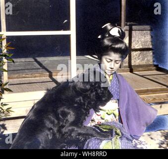 Ragazza giapponese con il cane Foto Stock