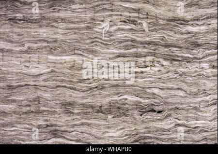 La lana minerale è usato come un materiale di isolamento termico nella costruzione di una casa. La lana di vetro dello sfondo. Foto Stock